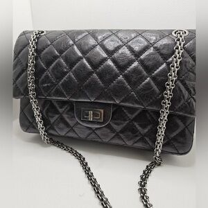 Chanel 2.55 reissue in black and silver hardware quilted aged calfskin  USED